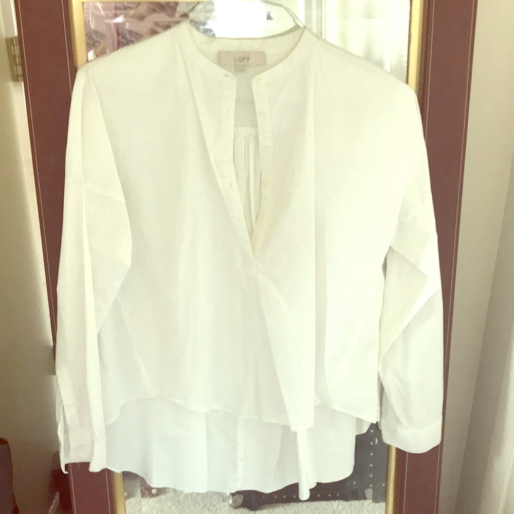 Collarless white blouse